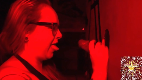 Black and blonde girl is getting her mouth filled with a dick