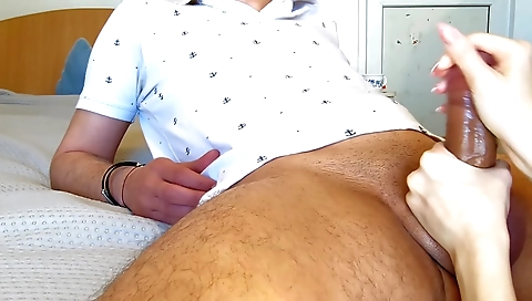 Buxom blonde with long legs is on top of a man's cock