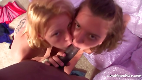 Three lesbians in the threesome play with each other