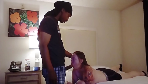 Amateur interracial sex video with a red-haired blonde