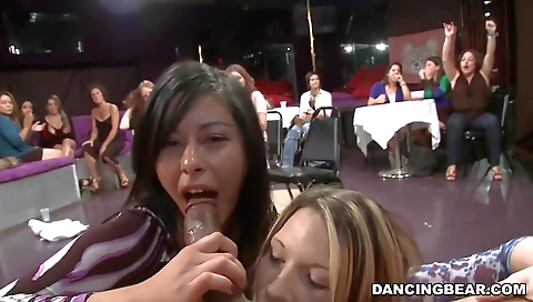 Blonde and a blonde couple with a big cock in a group sex scene