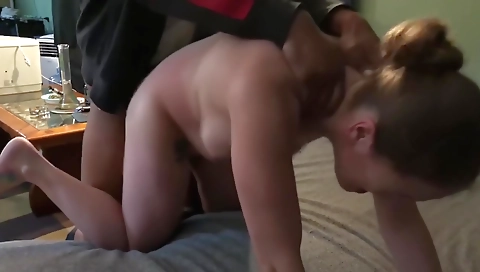 Busty blonde with a big cock rides a black man in the backyard